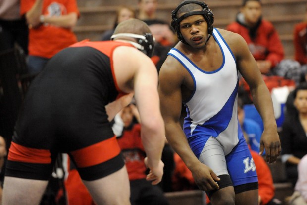 Lake Central's Gelen Robinson stares down opponent Jack Seaman of Munster